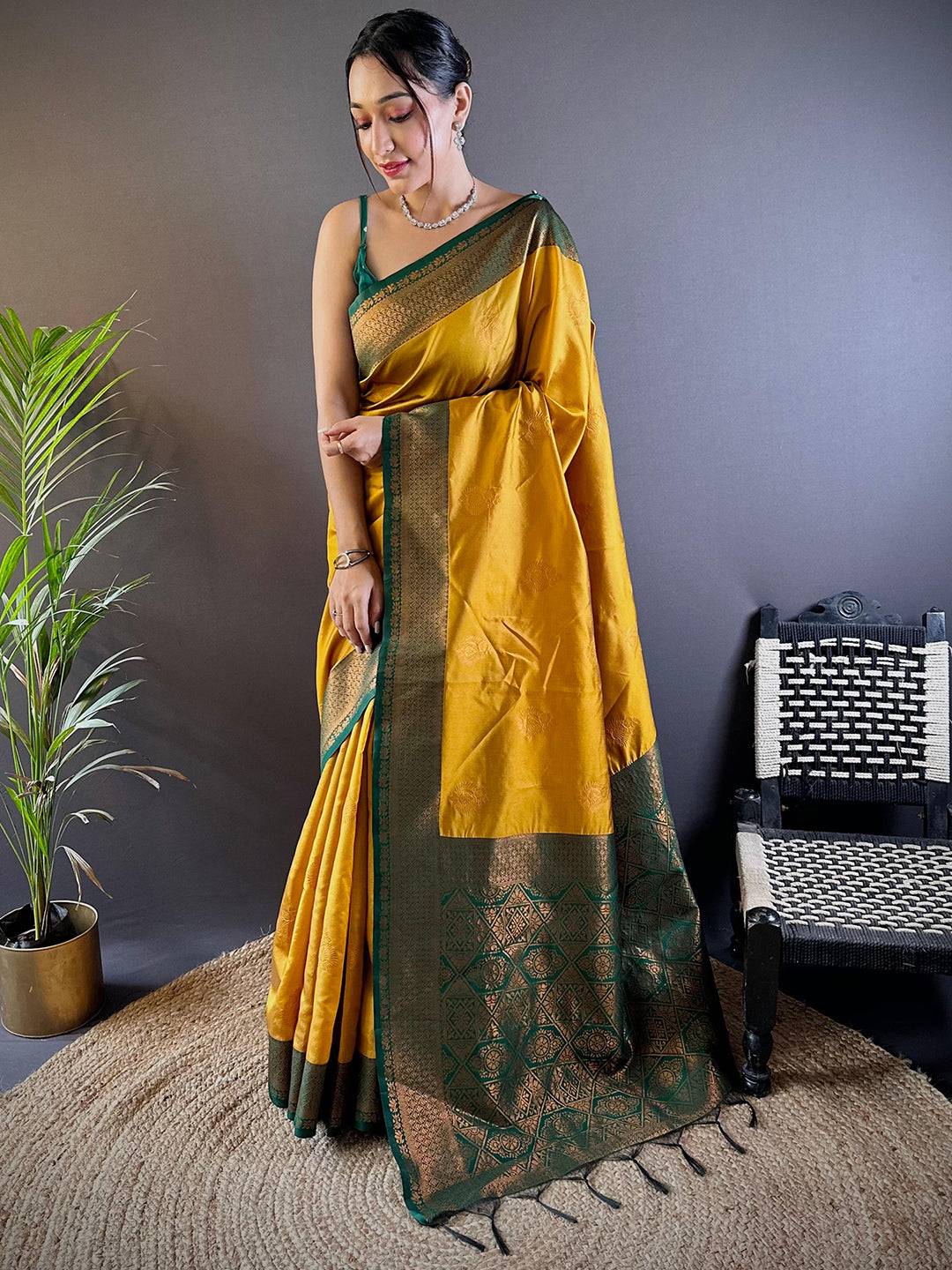 Elegant Yellow Silk Pattu Saree With Gold Zari Motifs