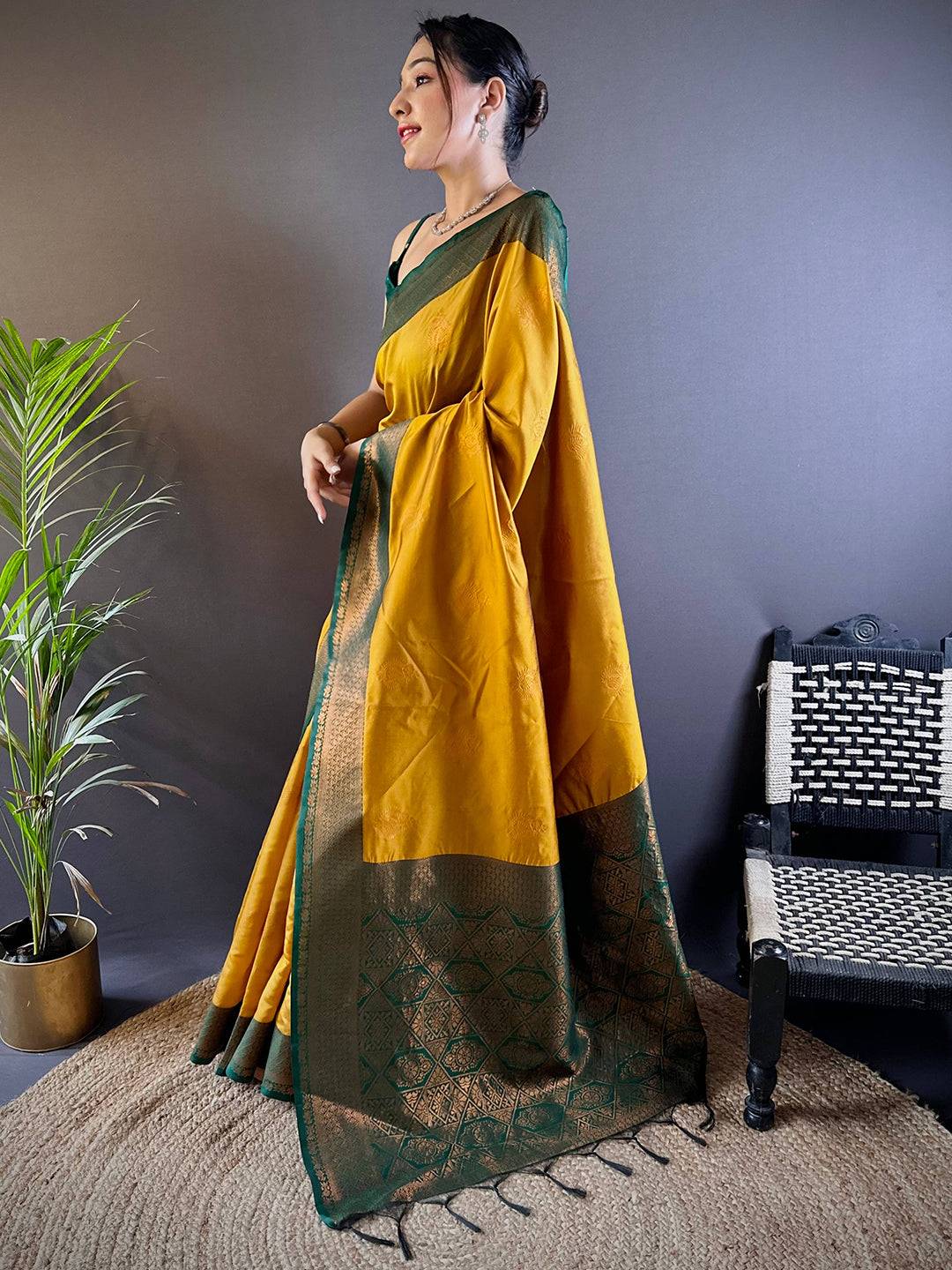 Elegant Yellow Silk Pattu Saree With Gold Zari Motifs