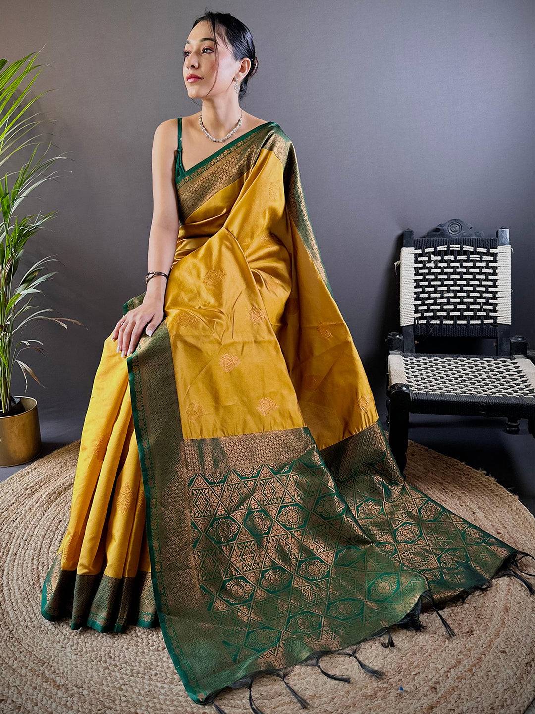 Elegant Yellow Silk Pattu Saree With Gold Zari Motifs