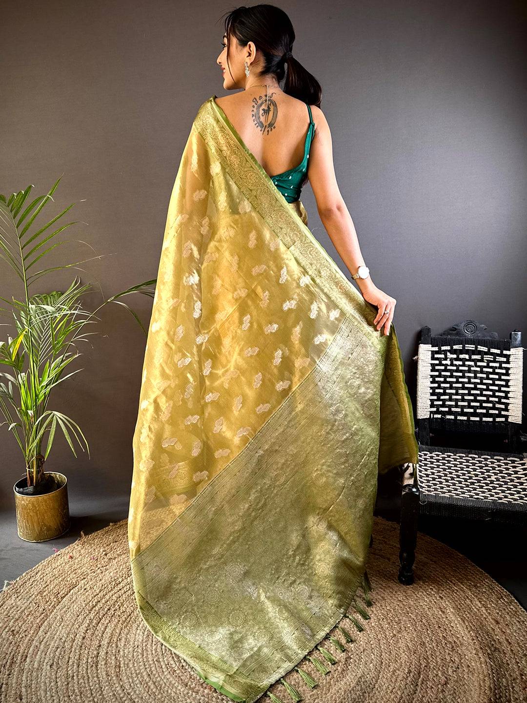Graceful Olive Kora Tissue Pattu Saree