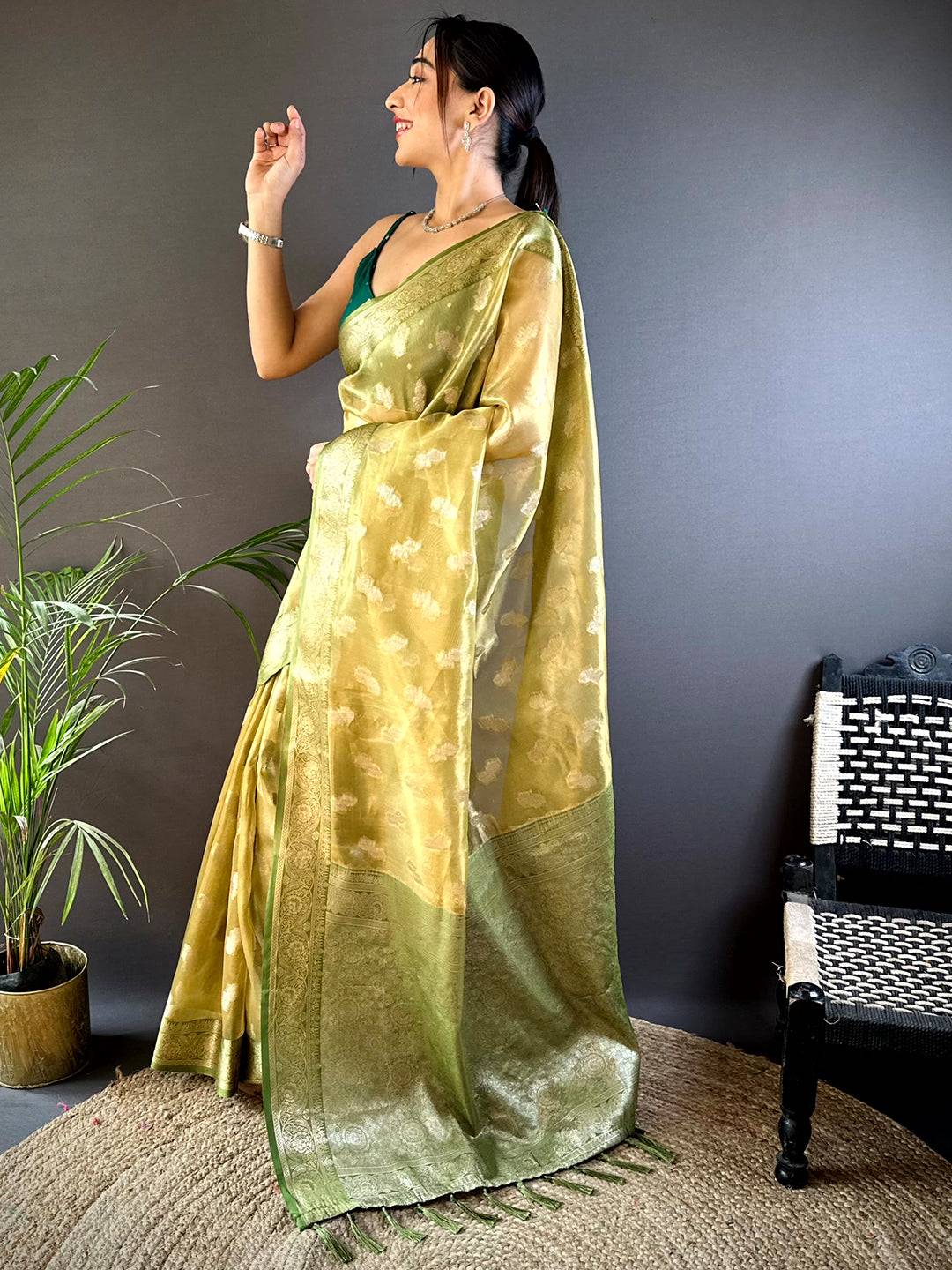 Graceful Olive Kora Tissue Pattu Saree