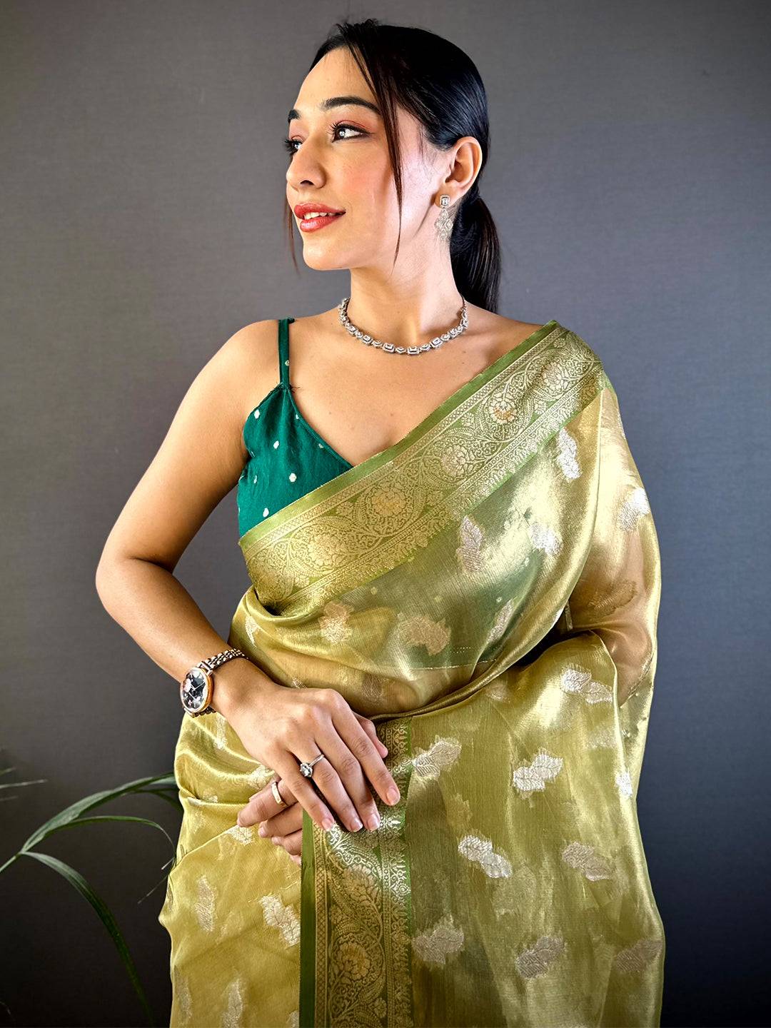 Graceful Olive Kora Tissue Pattu Saree