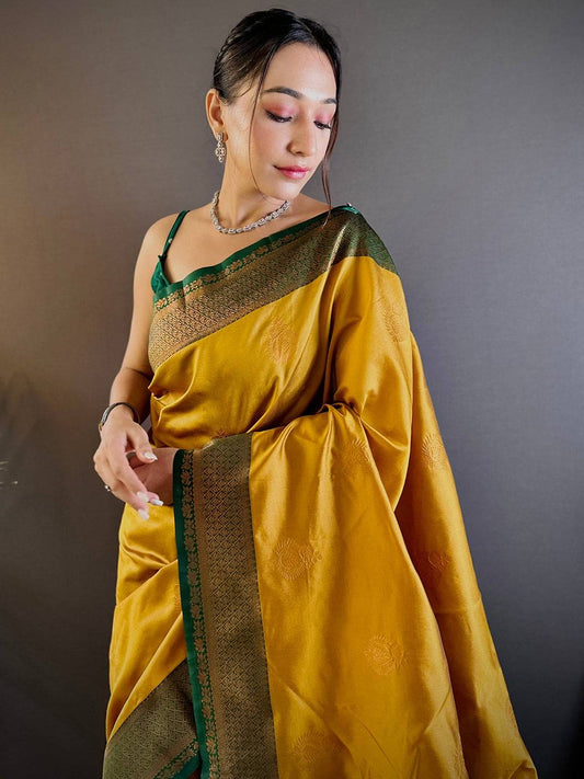 Elegant Yellow Silk Pattu Saree With Gold Zari Motifs